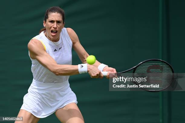 Andrea Petkovic of Germany plays a backhand against Viktorija Golubic of Switzerland during their Women's Singles First Round Match on day two of The...