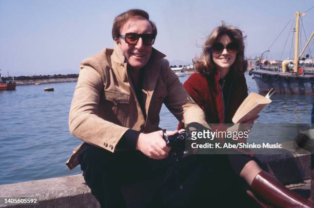 Peter Sellers & Lynne Frederick by the port Hong Kong, circa 1970s.