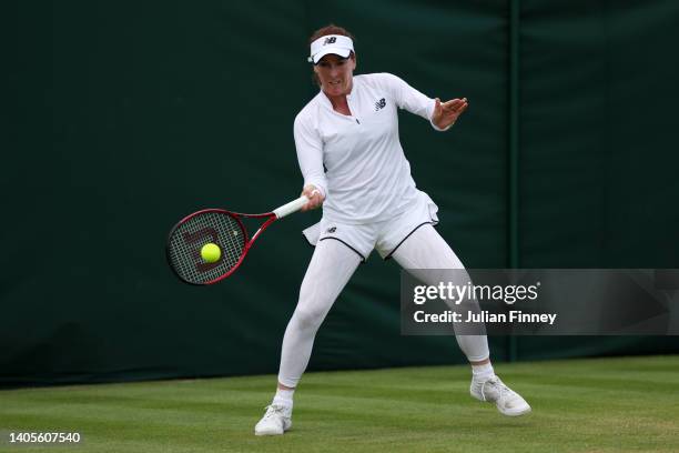 Madison Brengle of United States plays a forehand against Lauren Davis of United States during their Women's Singles First Round Match on day two of...