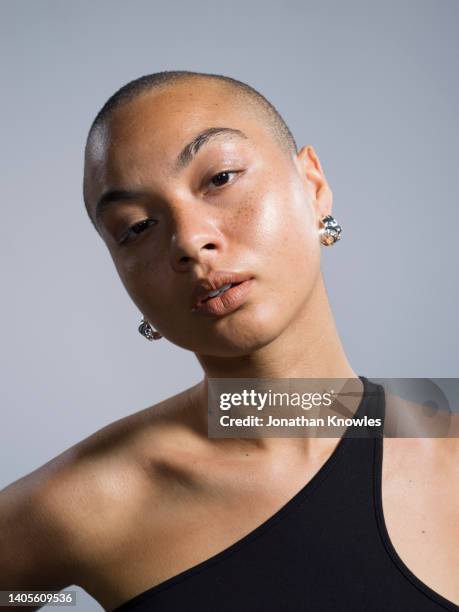 portrait confident, beautiful young woman - fashion close up stock pictures, royalty-free photos & images