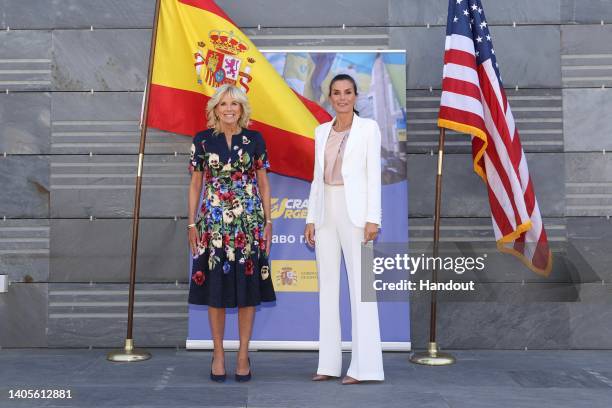 In this handout image provided by the Spanish Royal Household, U.S. First Lady Jill Biden and Queen Letizia of Spain are seen visiting the CREADE on...