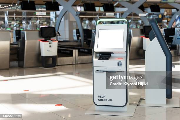 self check in kiosk machine in the modern airport - kiosk stock pictures, royalty-free photos & images