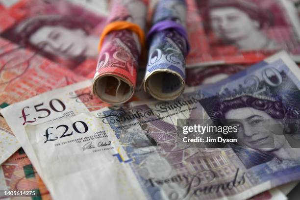 Photo illustration of the British paper £20 and £50 banknotes that will soon be taken out of circulation, June 28, 2022 in London, England. The Bank...