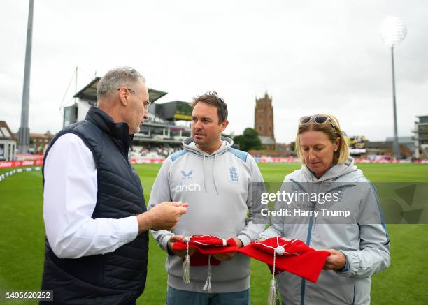Lisa Keightley, Head Coach of England and Tim Macdonald are presented with their Coaching Caps by Professor John Neal, Head of Coach Development of...