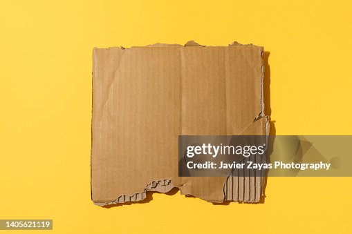 Cardboard Banner On Yellow Background Cardboard Banner On Yellow Background