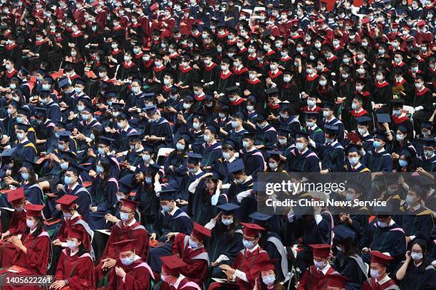 Graduates take part in a graduation ceremony at Sun Yat-sen University on June 28, 2022 in Guangzhou, Guangdong Province of China.