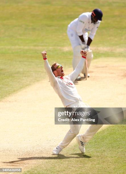 Simon Harmer of Essex celebrates the wicket of Keith Barker of Hampshire to win the match during the LV= Insurance County Championship match between...