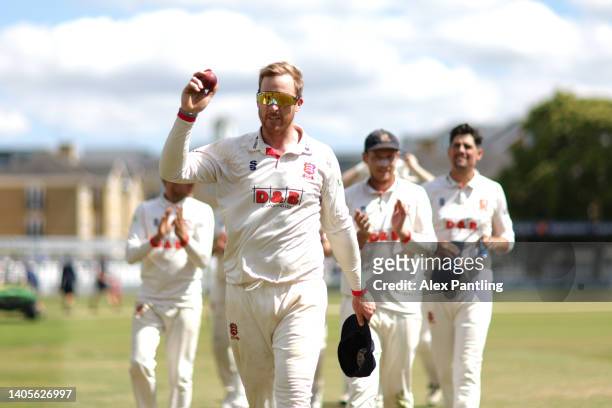 Simon Harmer of Essex walks off the pitch to a standing ovation after taking seven wickets in the match during the LV= Insurance County Championship...