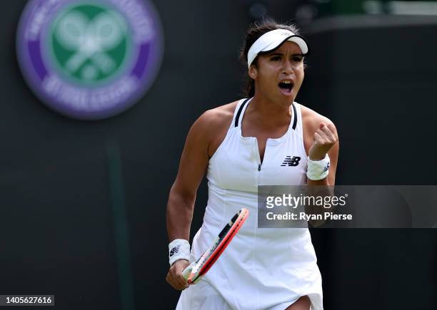 Heather Watson of Great Britain celebrates against Tamara Korpatsch of Germany during their Women's Singles First Round Match on day two of The...