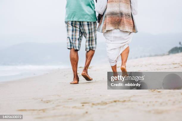 senior african american couple walking on beach - old man feet stock pictures, royalty-free photos & images