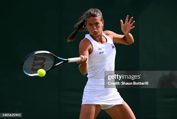 Chloe Paquet of France plays a forehand against Irina Bara of Romania during their Women's Singles First Round Match on day two of The Championships...