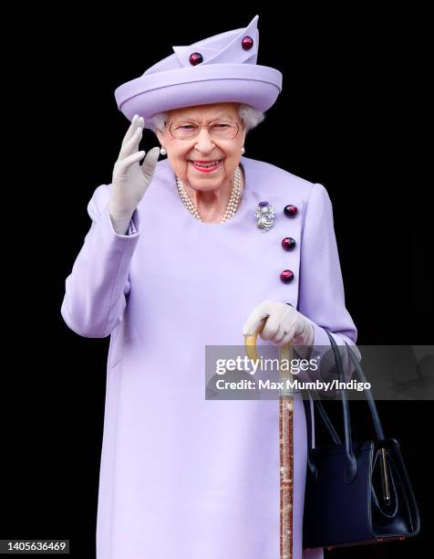 Queen Elizabeth II attends an Armed Forces Act of Loyalty Parade in the gardens of the Palace of Holyroodhouse on June 28, 2022 in Edinburgh,...