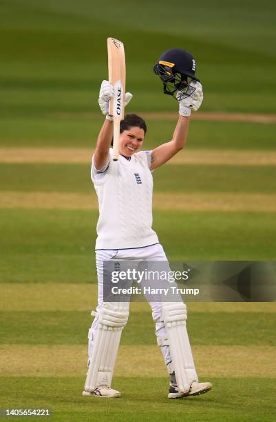 Alice Davidson-Richards of England celebrates their century during Day Two of the First Test Match between England Women and South Africa Women at...