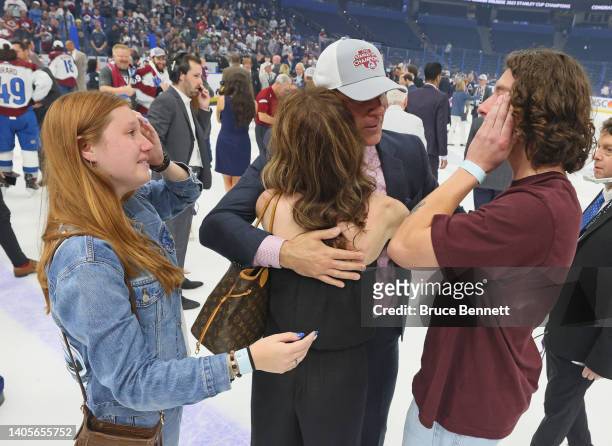 Head coach Jared Bednar and his family celebrate after winning the Stanley Cup following the series winning victory over the Tampa Bay Lightning in...