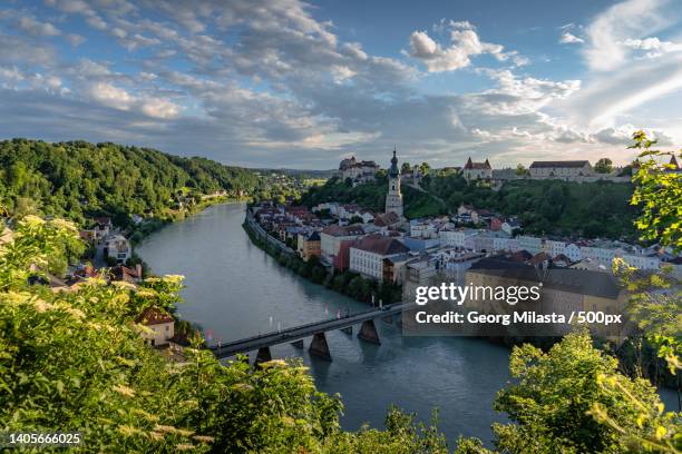 high angle view of river amidst buildings in city,sparkassenweg,duttendorf,austria - kontrastreich stock pictures, royalty-free photos & images