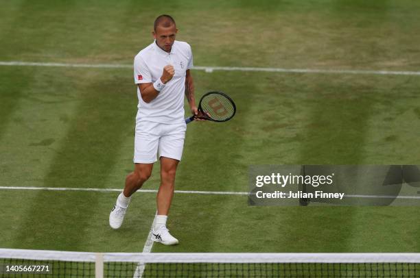 Dan Evans of Great Britain celebrates against Jason Kubler of Australia during their Men's Singles First Round Match on day two of The Championships...