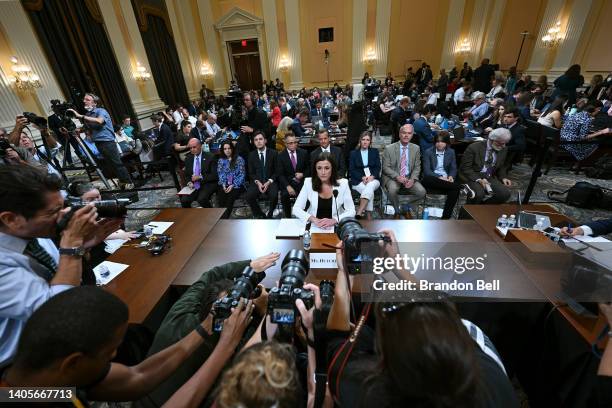 Cassidy Hutchinson, a top former aide to Trump White House Chief of Staff Mark Meadows, takes her seat following a break as she testifies during the...