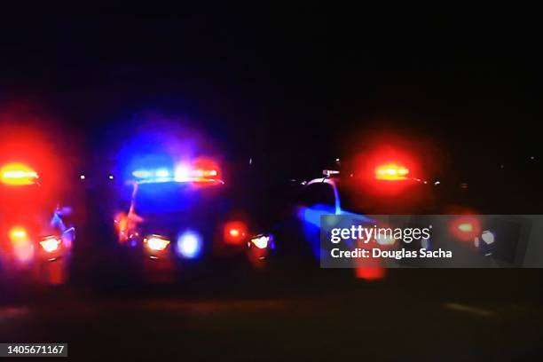 police roadblock at night - police car lights 個照片及圖片檔