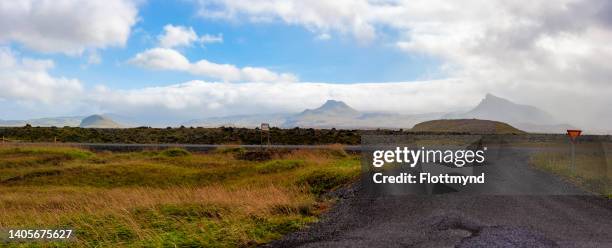 just outside hellisandur you can find this beautiful view towards snaefellsjokull - snaefellsjokull stock pictures, royalty-free photos & images