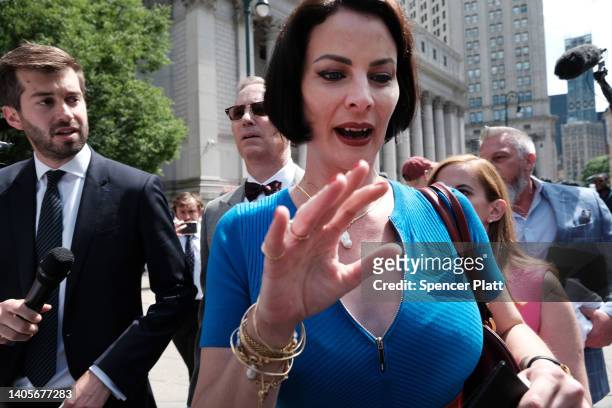 Sarah Ransome, who has accused Jeffrey Epstein of sexual abuse, walks out of Manhattan Federal Court after the sentencing of former socialite...