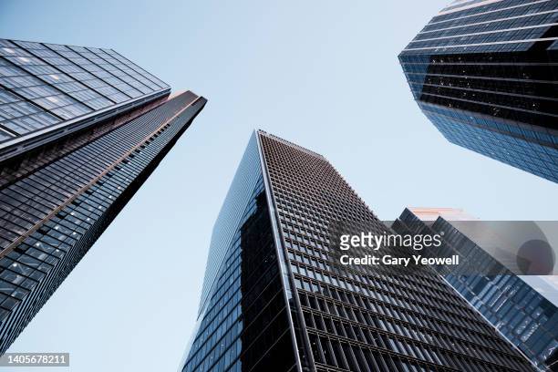 low angle view of skyscrapers in  london - cityscape stock pictures, royalty-free photos & images