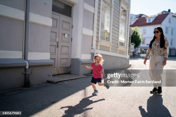 mom and her baby girl exploring kragerø - kragerø stock pictures, royalty-free photos & images