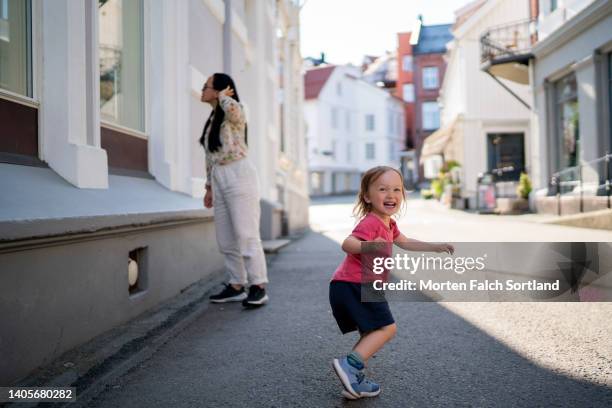 mom and her baby girl exploring kragerø, norway - kragerø stock pictures, royalty-free photos & images