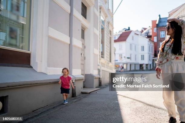 mom and her baby girl exploring kragerø - kragerø stock pictures, royalty-free photos & images