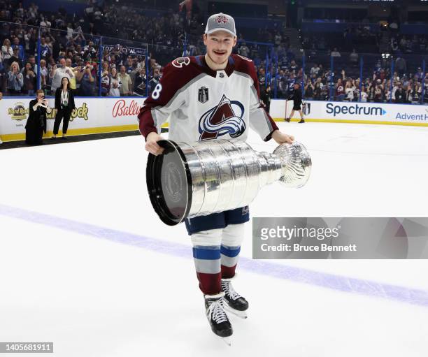 H8#2of the Colorado Avalanche carries the Stanley Cup following the series winning victory over the Tampa Bay Lightning in Game Six of the 2022 NHL...