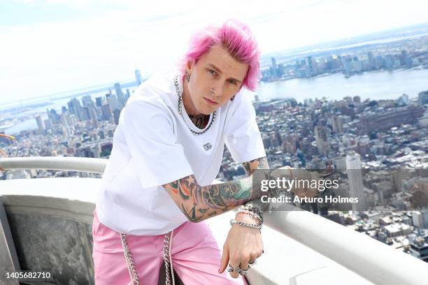 Machine Gun Kelly visits the Empire State Building on June 28, 2022 in New York City.