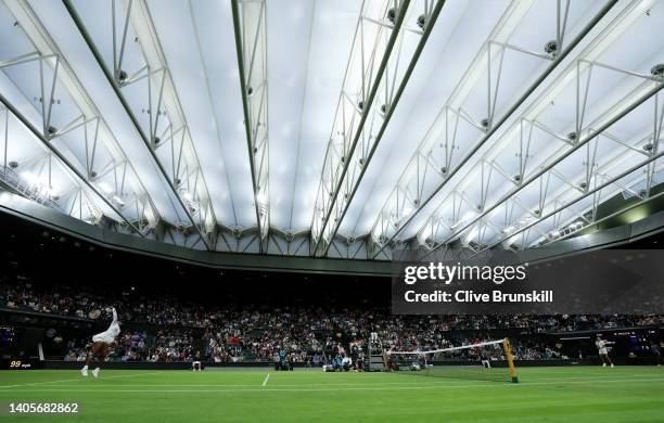 General view of centre court with the roof closed as Serena Williams of United States serves against Harmony Tan of France during their Women's...