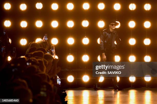 Fashion designer Hedi Slimane walks the runway during the Celine Ready to Wear Spring/Summer 2023 fashion show as part of the Paris Men Fashion Week...