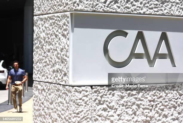The Creative Artists Agency logo is displayed outside their headquarters on June 28, 2022 in Los Angeles, California. CAA has acquired rival ICM...