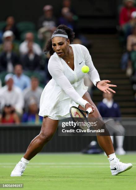 Serena Williams of United States plays a forehand against Harmony Tan of France during their Women's Singles First Round Match on day two of The...