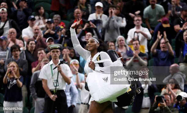 Serena Williams of The United States waves to the crowd after losing against Harmony Tan of France during their Women's Singles First Round Match on...