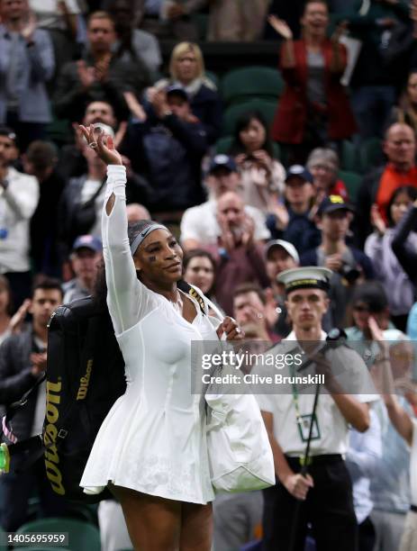 Serena Williams of The United States waves to the crowd after losing against Harmony Tan of France during their Women's Singles First Round Match on...