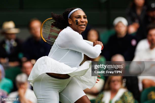 Serena Williams of the United States hits a forehand against Harmony Tan of France in the first round of the women's singles during day two of The...