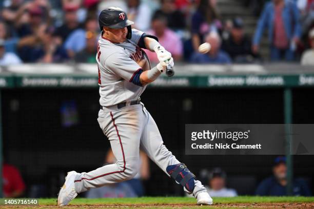 José Miranda of the Minnesota Twins hits a solo home run against Enyel De Los Santos of the Cleveland Guardians in the sixth inning of game two of a...