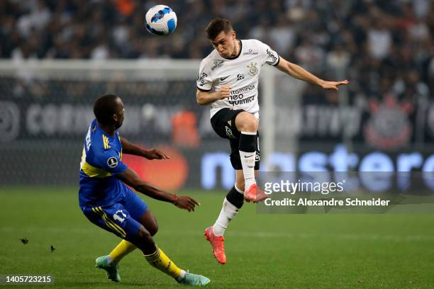 Lucas Piton of Corinthians fights for the ball with Luis Advíncula of Boca Juniors during a round of sixteen first leg match between Corinthians and...