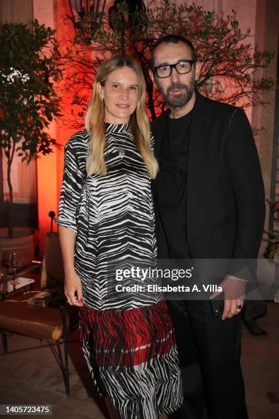 Alessandro Sartori and Elisabetta Marra attend the Zegna "Our Road To Rome" cocktail dinatoire at Palazzo Torlonia on June 28, 2022 in Rome, Italy.