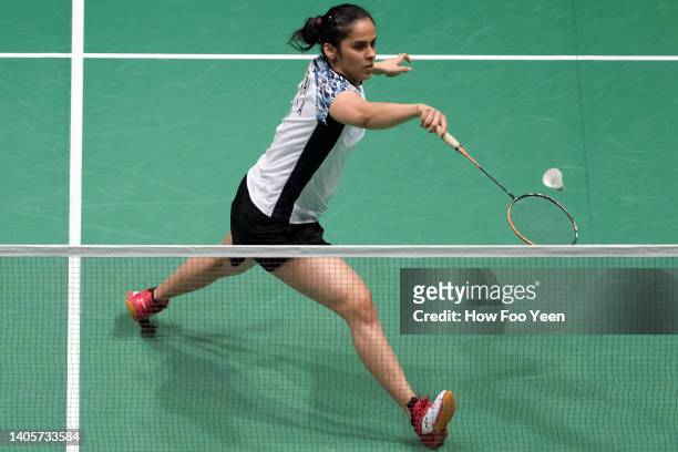 Saina Nehwal of India in action against Iris Wang of the United States in their women's singles first round match on day two of the Petronas Malaysia...
