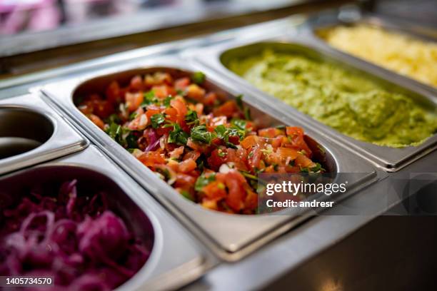 close-up on a salad bar at a street food restaurant - salad bar stock pictures, royalty-free photos & images