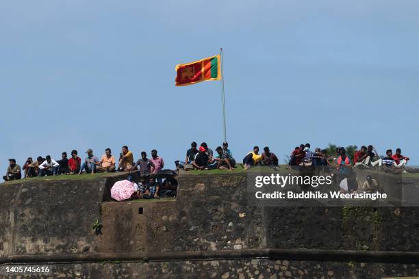 Fans watch the match during day one of the First Test in the series between Sri Lanka and Australia at Galle International Stadium on June 29, 2022...