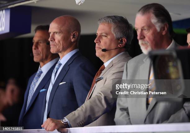 Broadcasters Chris Chelios, Mark Messier, Steve Levy and Barry Melrose look on during Game Six of the 2022 NHL Stanley Cup Final at Amalie Arena on...