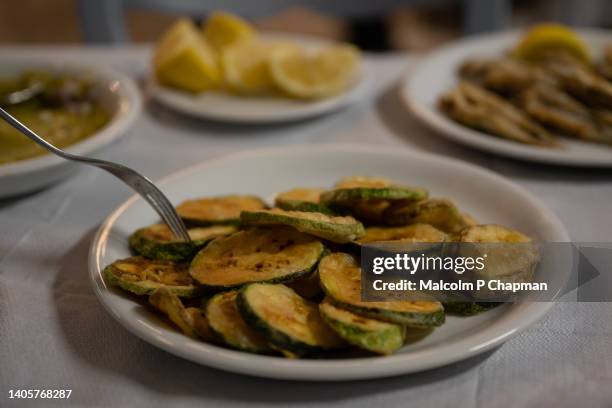 greek food - fried courgette (zucchini) - lesvos, greece - greek food imagens e fotografias de stock