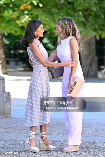 Queen Letizia of Spain greets Begona Gomez, First Lady of Spain at a Meeting With First Ladies at Royal Palace of La Granja of San Ildefonso during...