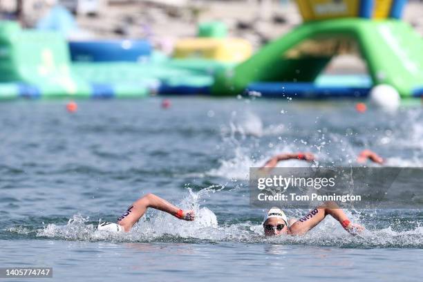 Sharon van Rouwendaal of Team Netherlands and Leonie Beck of Team Germany compete in the Open Water Women's 10km on day three of the Budapest 2022...