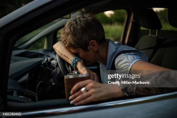 disaster, drunk driver behind the wheel - hip flask stock pictures, royalty-free photos & images