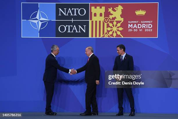 Jens Stoltenberg NATO Secretary General greets Recep Tayyip Erdogan, Turkish President while Pedro Sanchez, Spanish Prime Minister looks on before a...