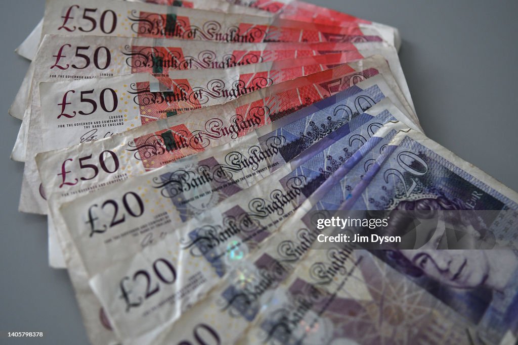 Sample. Money Notes A photo illustration of the British paper £20 and £50 banknotes that ...